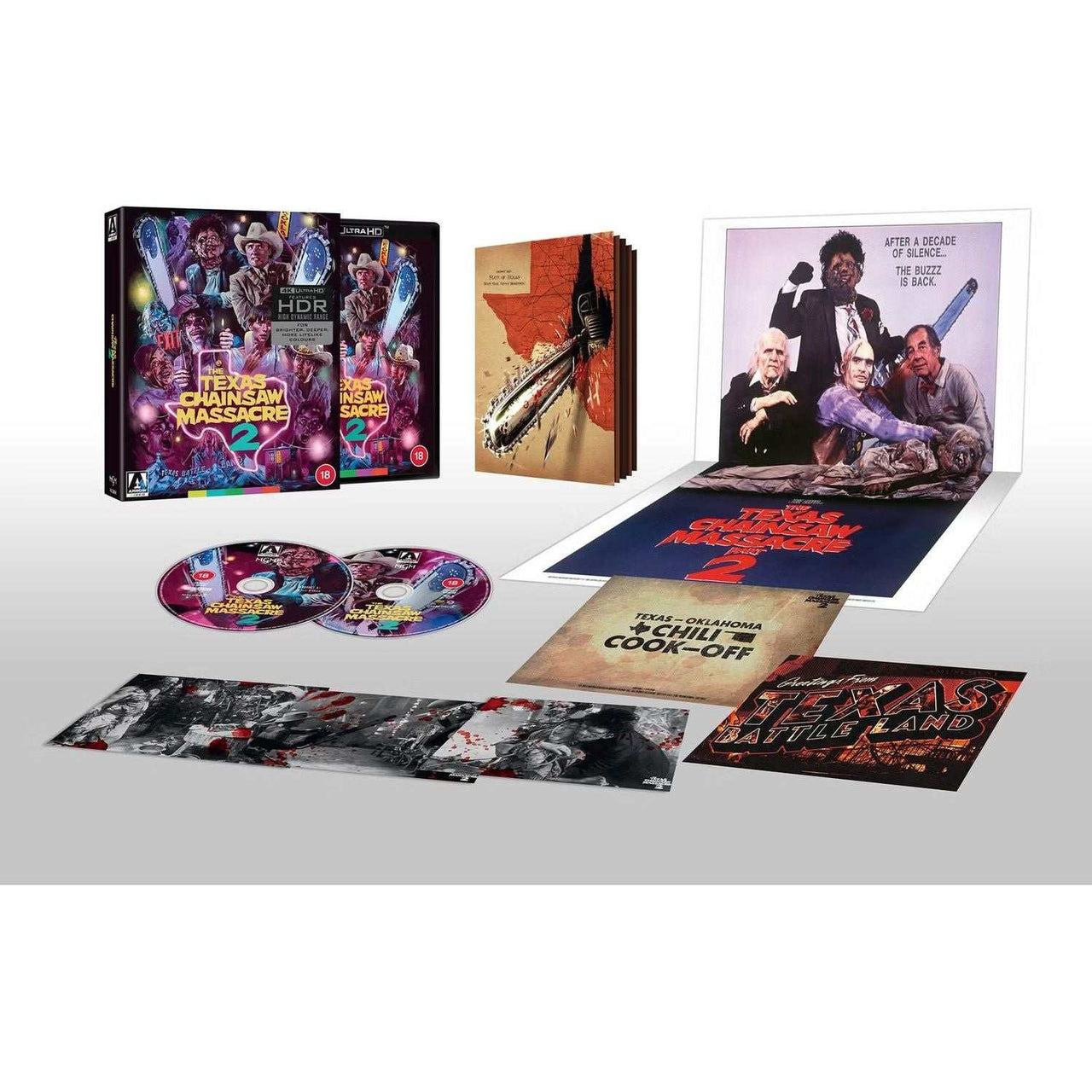 The Texas Chainsaw Massacre 2 Limited Edition 4K Ultra HD Blu-ray set with slipcase, booklet, posters, and extras.