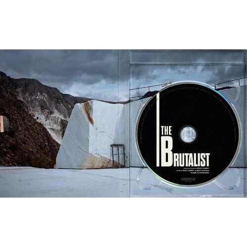 The Brutalist 4K UHD disc in open case with mountain landscape background.