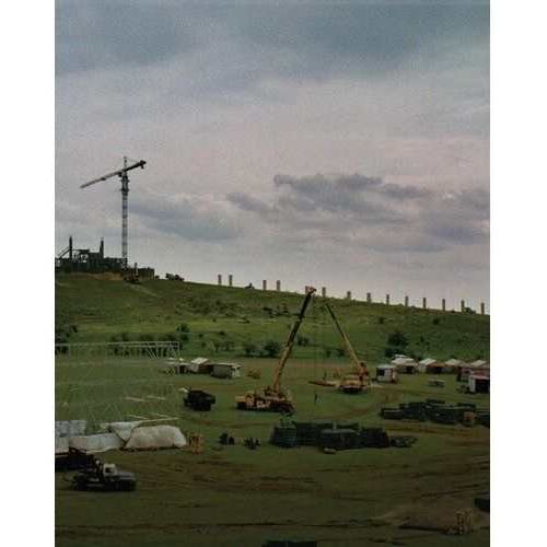 The Brutalist 4K UHD cover art featuring a construction site with cranes and rolling hills.