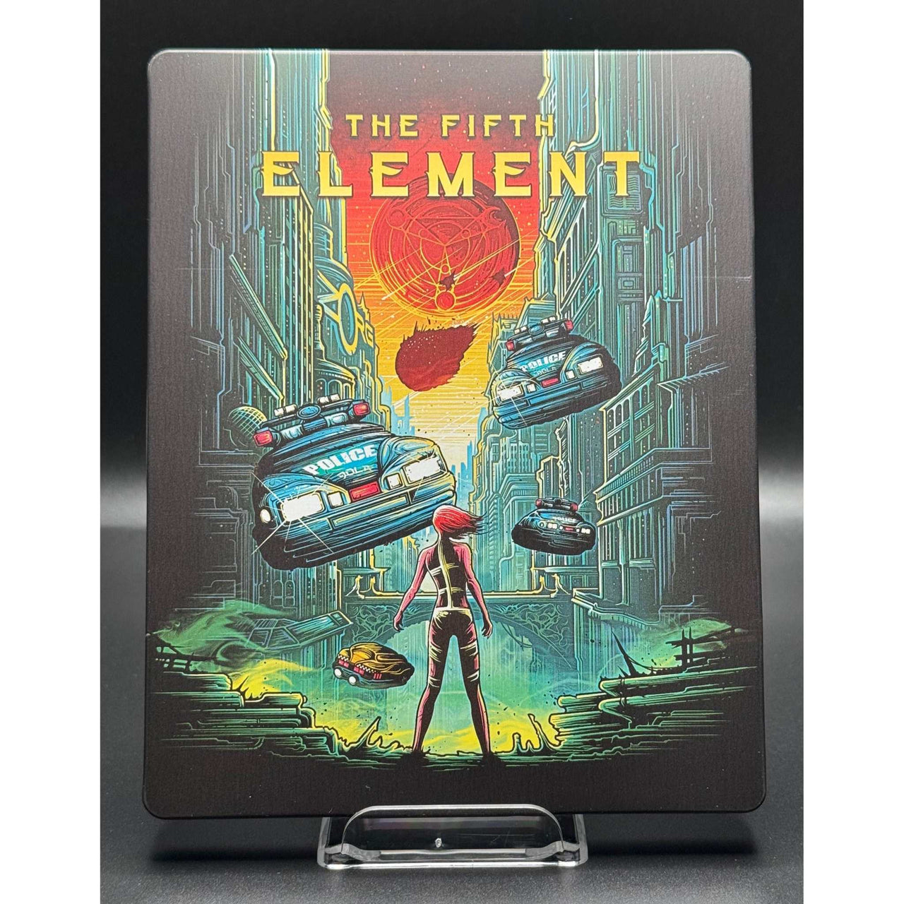 The Fifth Element 4K Ultra HD Blu-Ray Steelbook cover featuring futuristic artwork.