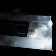 Limited Edition Deluxe LED VHS Fade to Black - Degausser Video in dim lighting.