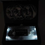 Limited Edition Deluxe LED VHS of "Fade to Black" featuring eerie artwork and glowing display.