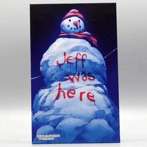 Degausser Video Limited Edition Deluxe LED VHS with snowman art and "Jeff was here" writing.