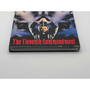 The Eleventh Commandment Blu-Ray (USED) with slipcover, minor wear, Vinegar Syndrome release.