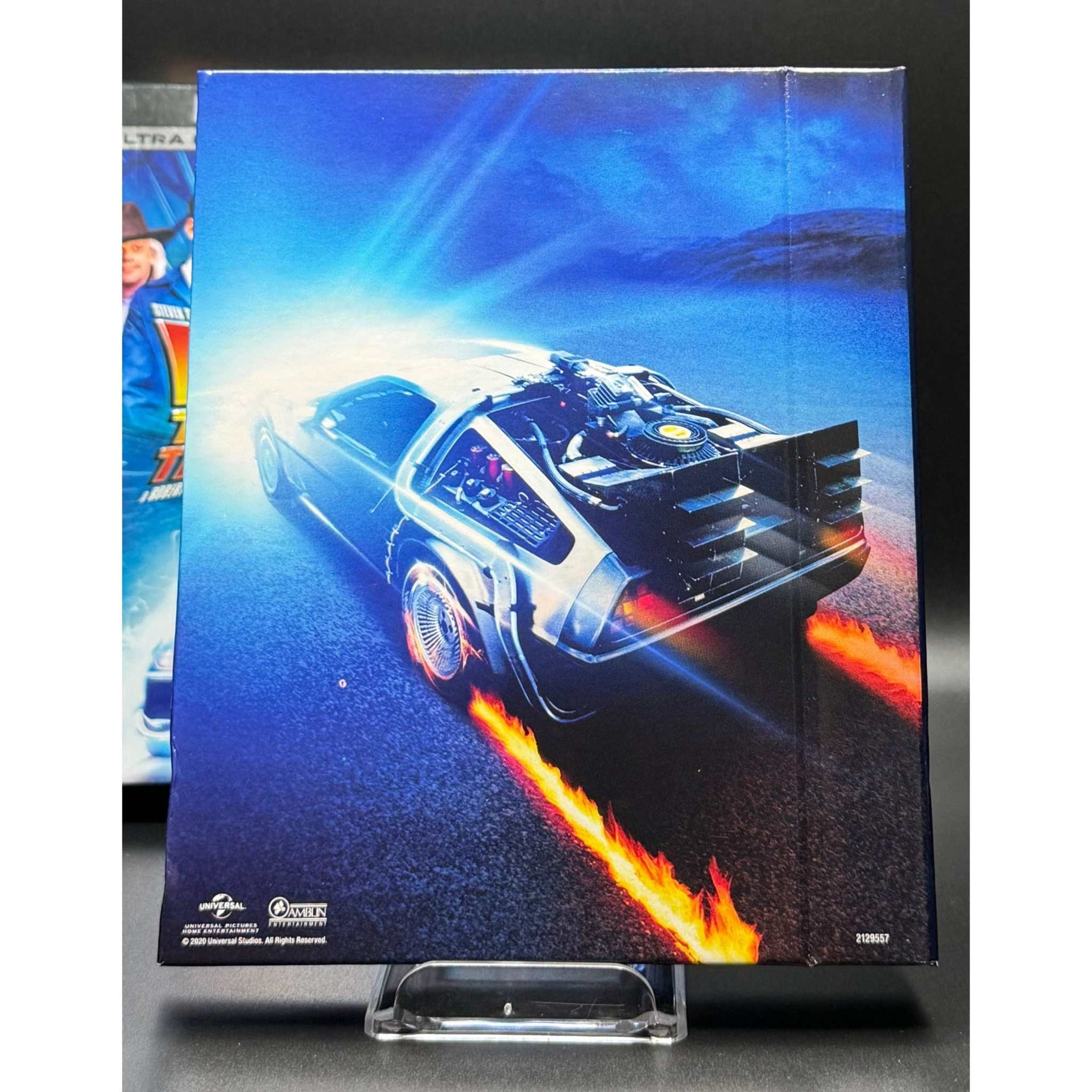 Back to the Future: The Ultimate Trilogy 4K Ultra HD Blu-Ray Digibook and Slipcase (USED) with DeLorean image.