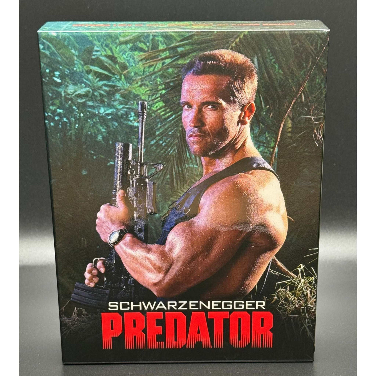 Predator Full Slip XL Collector's Edition with 3D Lenticular Magnet and Steelbook, featuring Arnold Schwarzenegger on the cover.