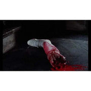 Bloodied severed arm in a horror scene from "Rabid Grannies" film on Blu-Ray.