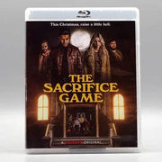 Blu-ray cover for "The Sacrifice Game" featuring main characters in an ominous setting, with tagline "This Christmas, raise a little hell."