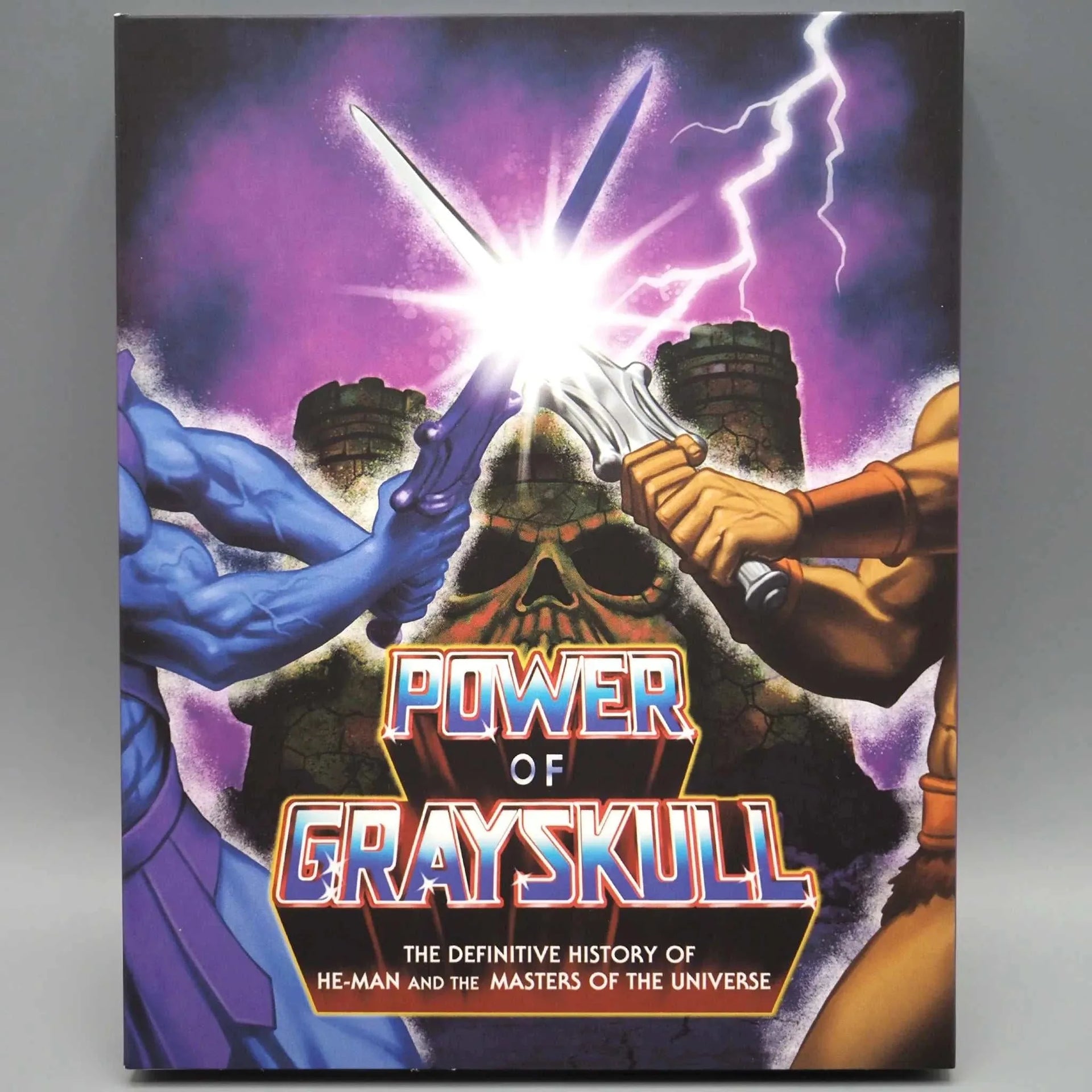 ETR Media Power of Grayskull: The Definitive History of He-Man and the Masters of the Universe with Slipcover front cover image